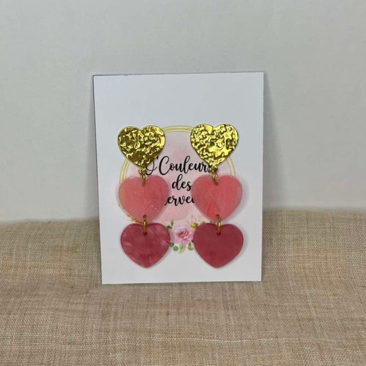 Boucles d'oreilles pendantes cœurs roses