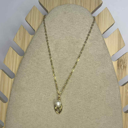 Collier coquillage et sa perle